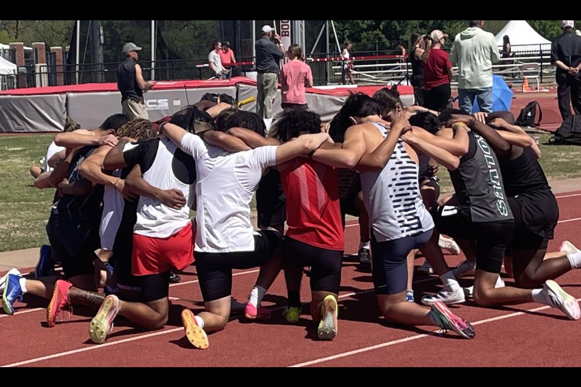 This group of athletes paused to pray before their race! The group was competing at the John Jacob’s Invitational at the University of Oklahoma.